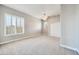 Well-lit bedroom with plantation shutters and double doors at 26886 N 90Th Ave, Peoria, AZ 85383