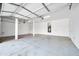 Large garage with white walls and high ceilings at 26886 N 90Th Ave, Peoria, AZ 85383