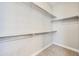 Large closet featuring shelves and hanging rods at 26886 N 90Th Ave, Peoria, AZ 85383
