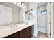 Bathroom with double vanity, tub, and shower at 26886 N 90Th Ave, Peoria, AZ 85383