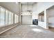 Large living room with high ceilings and lots of natural light at 26886 N 90Th Ave, Peoria, AZ 85383