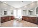 Luxurious bathroom with double vanities, soaking tub, and tiled shower at 26886 N 90Th Ave, Peoria, AZ 85383