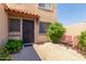 Front entrance with dark brown door and seating area at 4025 W Palomino Rd, Phoenix, AZ 85019