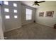 Bedroom with carpeted floor and window at 7041 E Keats Ave, Mesa, AZ 85209