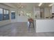 View of kitchen and dining area, showing island and breakfast bar at 17226 W Maui Ln, Surprise, AZ 85388