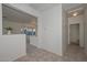 Bright entryway with tile floors and views to living and dining areas at 17226 W Maui Ln, Surprise, AZ 85388