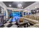 Spacious living room with a checkerboard floor and access to the backyard at 12789 W Via Caballo Blanco --, Peoria, AZ 85383