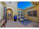 Private courtyard with seating and a view into the home at 12789 W Via Caballo Blanco --, Peoria, AZ 85383