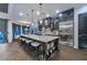 Spacious kitchen with hardwood floors, large island, and stainless steel appliances at 12789 W Via Caballo Blanco --, Peoria, AZ 85383
