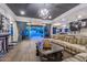 Spacious living room with a checkerboard floor and access to the backyard at 12789 W Via Caballo Blanco --, Peoria, AZ 85383