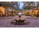 Charming courtyard with fountain and string lights at 12789 W Via Caballo Blanco --, Peoria, AZ 85383