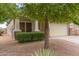 House exterior with a two car garage and manicured landscaping at 29759 N Desert Angel Dr, San Tan Valley, AZ 85143