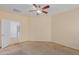 Spacious bedroom with ceiling fan and neutral walls at 29759 N Desert Angel Dr, San Tan Valley, AZ 85143