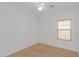 Simple bedroom with window and ceiling fan at 29759 N Desert Angel Dr, San Tan Valley, AZ 85143