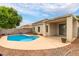 Inviting kidney-shaped pool with a spacious patio at 29759 N Desert Angel Dr, San Tan Valley, AZ 85143