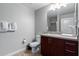 Bathroom with toilet, vanity, and large mirror at 5450 E Deer Valley Dr # 4169, Phoenix, AZ 85054