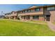 Front view of a townhome community with well-maintained landscaping at 6757 N 44Th Ave, Glendale, AZ 85301