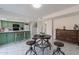 Kitchen dining area with a rustic table and chairs at 6757 N 44Th Ave, Glendale, AZ 85301