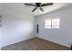 Spacious bedroom with ceiling fan, neutral walls, and carpet at 6757 N 44Th Ave, Glendale, AZ 85301