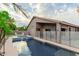 Relaxing pool area with a spa and a partially covered patio at 16567 W Mckinley St, Goodyear, AZ 85338