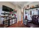 Relaxing bedroom with a large TV and ample storage at 41301 W Sussex Dr, Maricopa, AZ 85138