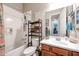 Bathroom with shower/tub combo and vanity at 41301 W Sussex Dr, Maricopa, AZ 85138