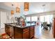 Kitchen with large island, stainless steel appliances, and ample counter space at 41301 W Sussex Dr, Maricopa, AZ 85138