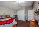 Spacious bedroom with double bed and ample closet space at 41301 W Sussex Dr, Maricopa, AZ 85138