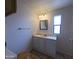 Clean bathroom with vanity, mirror, and a toilet at 11596 W Sierra Dawn Blvd # 224, Surprise, AZ 85378