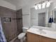 Clean bathroom with a walk-in shower, toilet and single vanity at 18812 N 90Th Pl, Scottsdale, AZ 85255