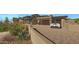 Contemporary home with a two-car garage and desert landscaping at 39494 N 105Th St # 74, Scottsdale, AZ 85262