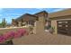 Modern home with covered patio, landscaped grounds, and a spacious garage at 39494 N 105Th St # 74, Scottsdale, AZ 85262
