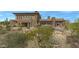 Back exterior of modern Southwestern home with mountain views at 39494 N 105Th St # 74, Scottsdale, AZ 85262