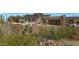 Luxury home with a pool and spa, showcasing a beautiful desert landscape at 39494 N 105Th St # 74, Scottsdale, AZ 85262