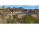 Modern rectangular pool with a waterfall feature, situated on a hillside at 39494 N 105Th St # 74, Scottsdale, AZ 85262