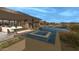 Inviting pool and spa with a fire pit and seating area at 39494 N 105Th St # 74, Scottsdale, AZ 85262