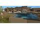Resort-style pool and spa with waterfall feature at 39494 N 105Th St # 74, Scottsdale, AZ 85262