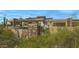 Contemporary home with a large pool and beautiful desert landscaping at 39494 N 105Th St # 74, Scottsdale, AZ 85262