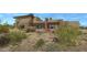 Luxury home with multiple outdoor living spaces and desert landscape at 39494 N 105Th St # 74, Scottsdale, AZ 85262