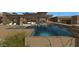 Spacious pool and spa with a waterfall feature at 39494 N 105Th St # 74, Scottsdale, AZ 85262