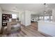 Home office with built-in shelving and view into living area at 9901 W Raintree Dr, Sun City, AZ 85351