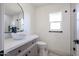 Clean bathroom, featuring a white vessel sink and walk-in shower at 9901 W Raintree Dr, Sun City, AZ 85351