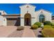 Charming one-story home with attractive landscaping and brick walkway at 4142 E Zion Pl, Chandler, AZ 85249