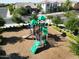 Aerial view of a playground with playset, slides, and surrounding landscaping at 4142 E Zion Pl, Chandler, AZ 85249