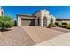 House exterior showcasing a brown garage door and brick driveway at 4142 E Zion Pl, Chandler, AZ 85249