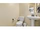 Clean bathroom with pedestal sink and updated toilet at 4142 E Zion Pl, Chandler, AZ 85249
