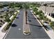 Community street with palm trees and landscaping at 4142 E Zion Pl, Chandler, AZ 85249