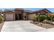 Two-car garage and large driveway at 17881 W Verdin Rd, Goodyear, AZ 85338