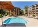 Relaxing hot tub area with lounge chairs nearby at 5450 E Deer Valley Dr # 2206, Phoenix, AZ 85054