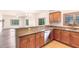 Well-equipped kitchen with wood cabinets and granite counters at 5450 E Deer Valley Dr # 2206, Phoenix, AZ 85054